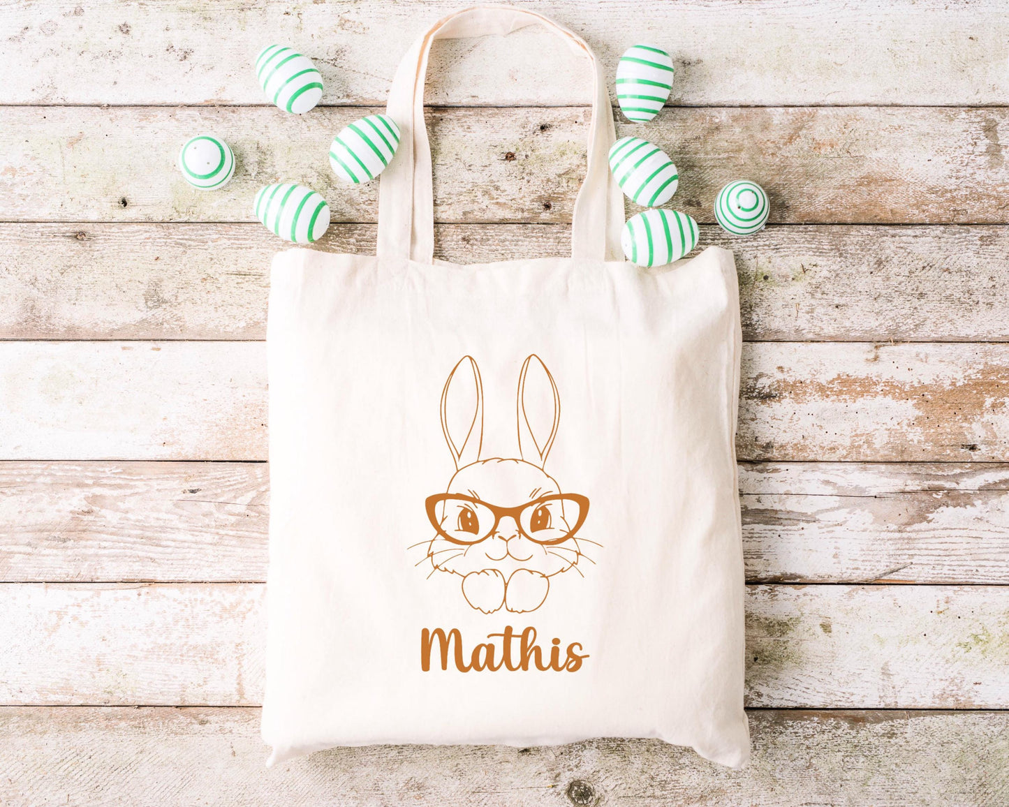 Tote bag Pâques personnalisé motif lapin et fleurs roses, sac chasse aux œufs en jute naturel avec prénom - Collection Pâques Mahelia Design