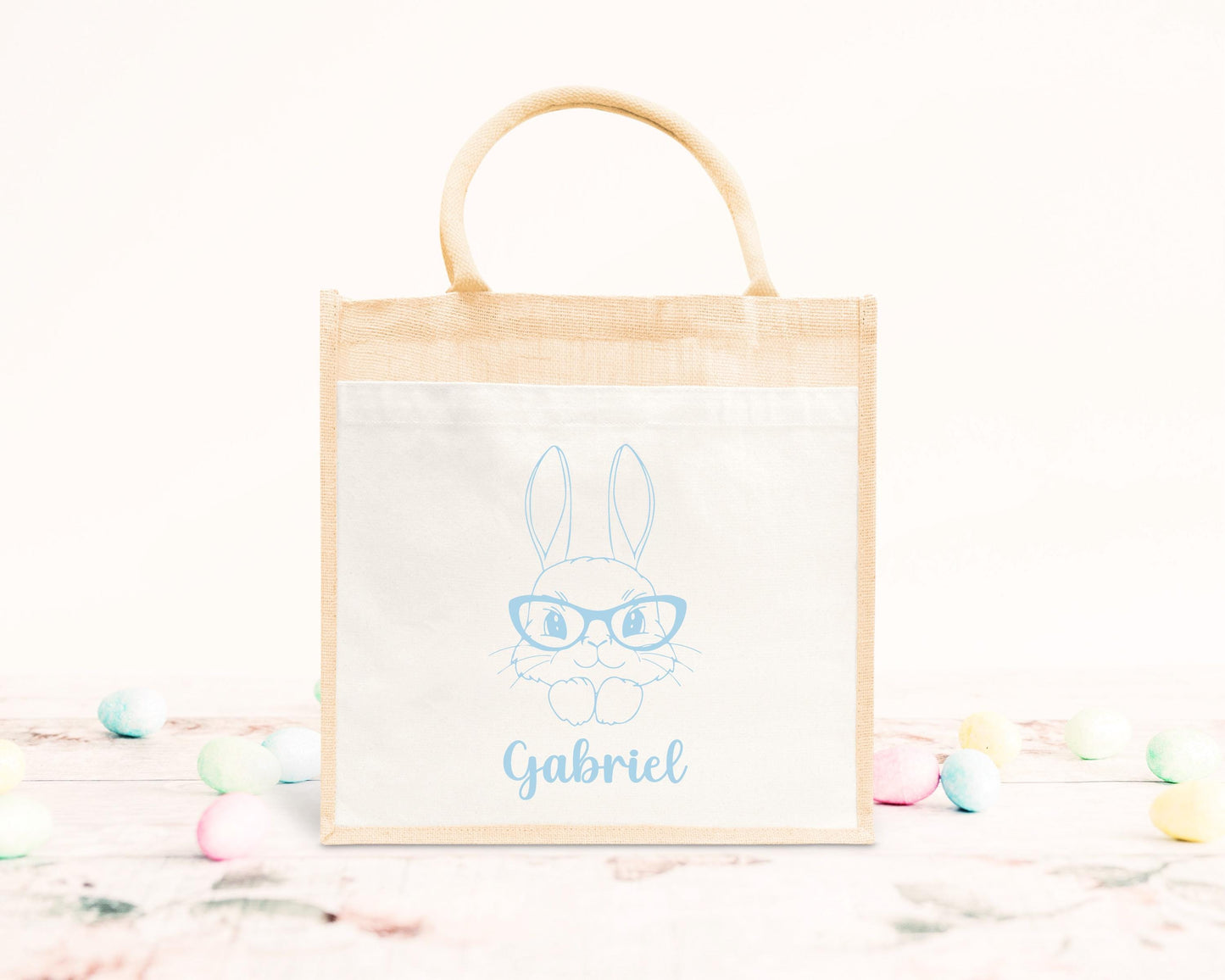 Cabas Pâques personnalisé motif lapin et fleurs roses, grand sac chasse aux œufs en jute naturel enfant - Collection Pâques Mahelia Design