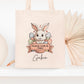 Mini tote bag Pâques personnalisé lapin et étoiles dorées, petit sac chasse aux œufs en jute naturel avec prénom - Collection Pâques 2025 Mahelia Design